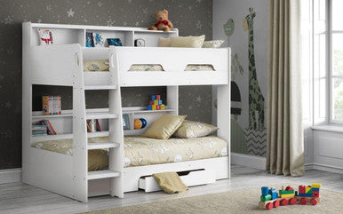 Close-up of underbed drawers and shelving unit on Orion white wooden bunk bed frame