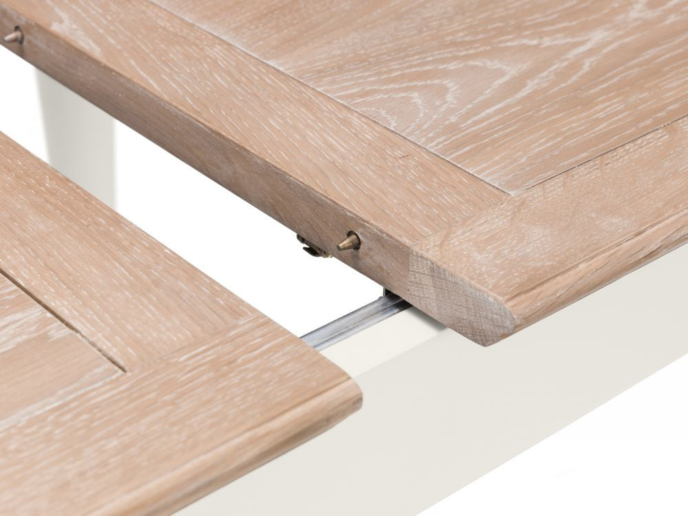 julian bowen oak 150cm-190cm extending dining table with white legs