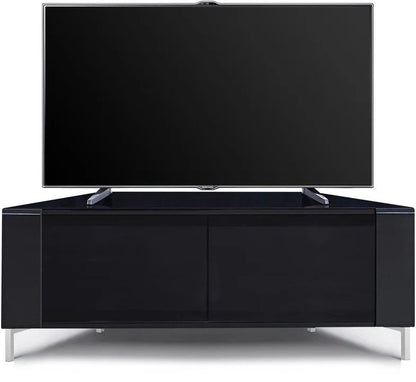 Space-saving CORVUS corner TV unit in modern living room with gloss black finish and chrome legs