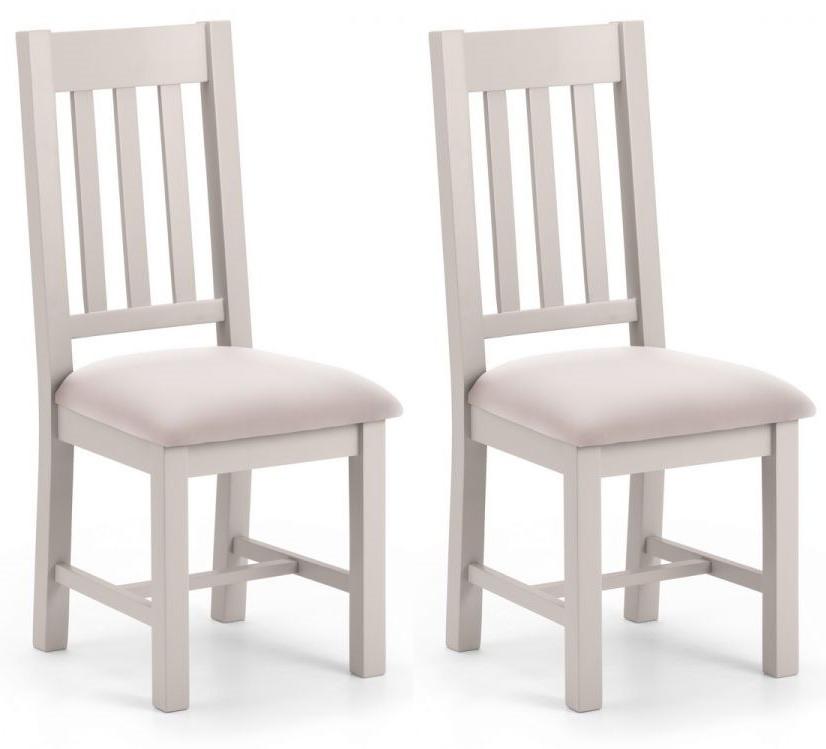 two grey wooden dining chairs by Julian Bowen