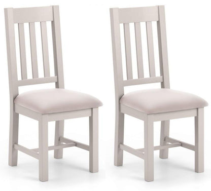 two grey wooden dining chairs by Julian Bowen